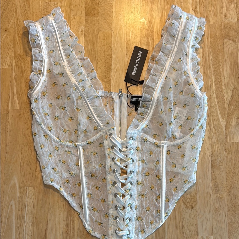 PrettyLittleThing Cream Ruffled Bustier Bodysuit